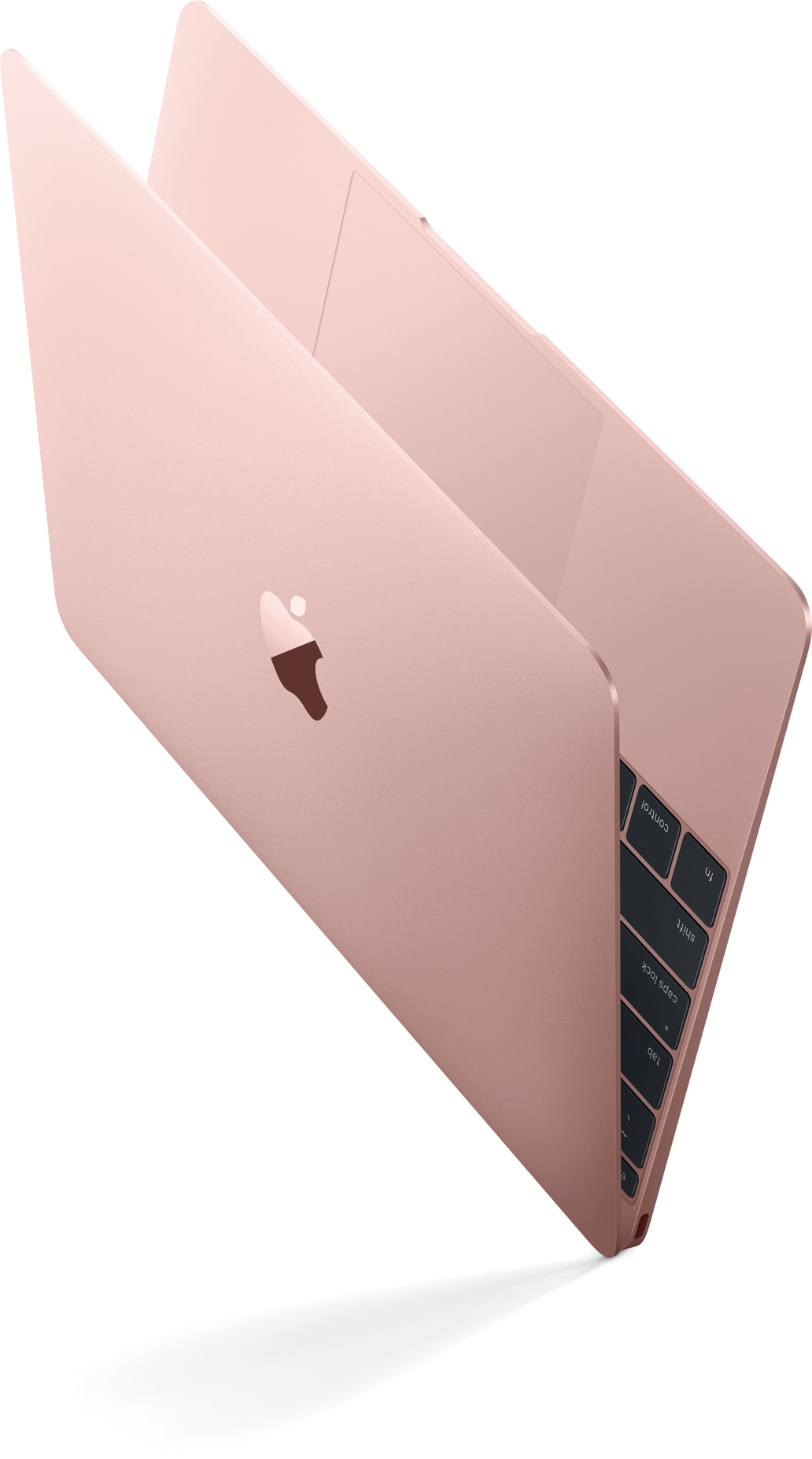 Pink gold MacBook tilted diagonally and sideways