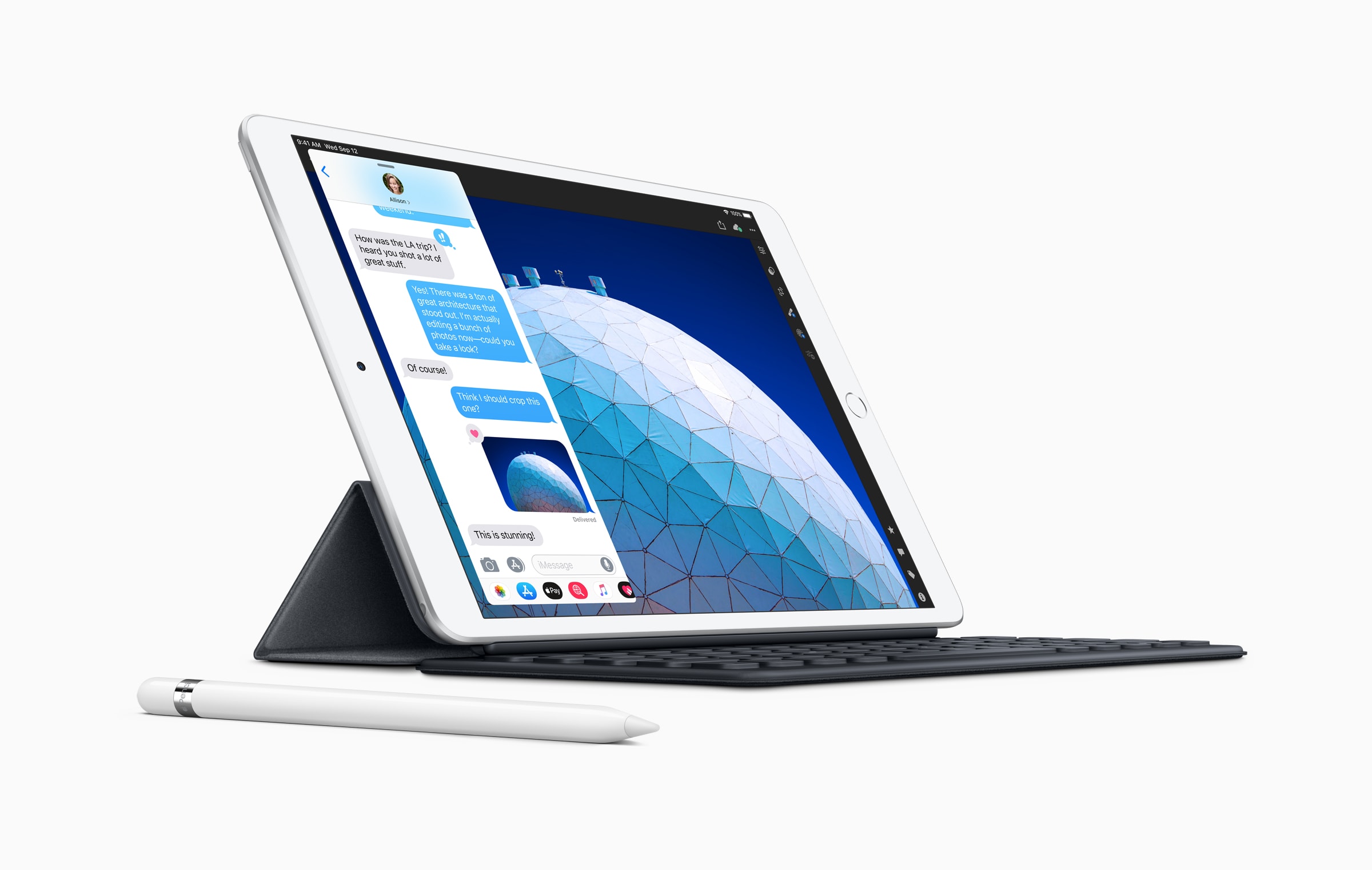 iPad Air aside with Smart Keyboard and Apple Pencil on the table