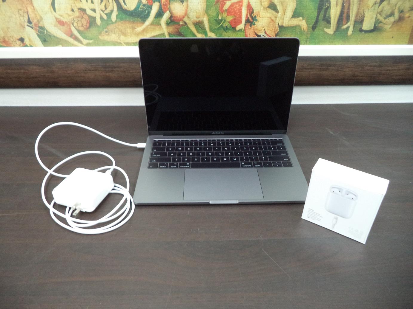 Lot # 68 from the IRS auction: AirPods and MacBook Pro