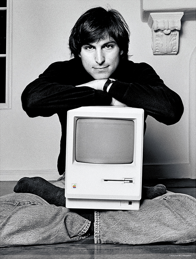 Photographer Norman Seeff sells Steve Jobs lithographs with the original Macintosh on his lap