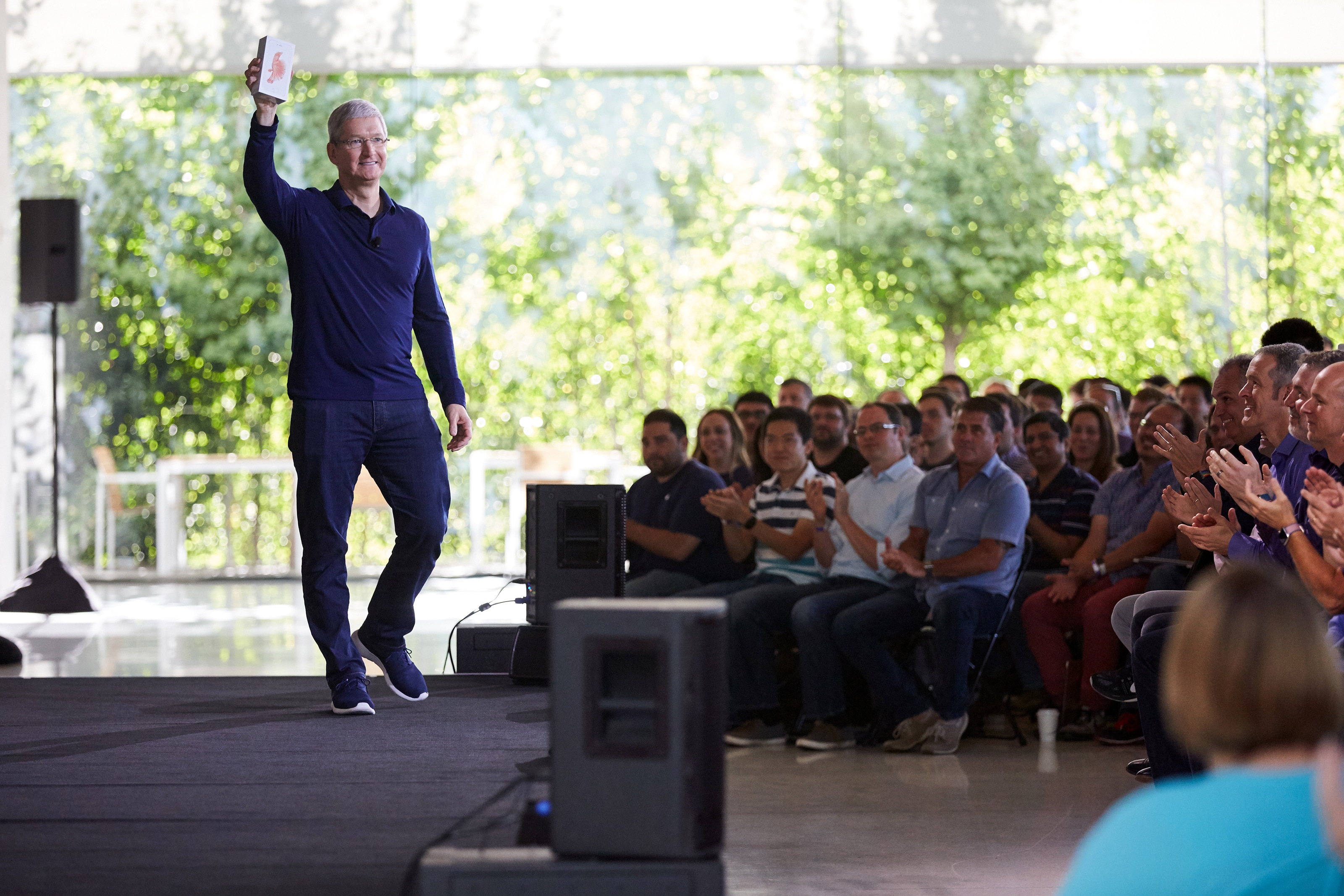 Tim Cook celebrating the billionth iPhone sold