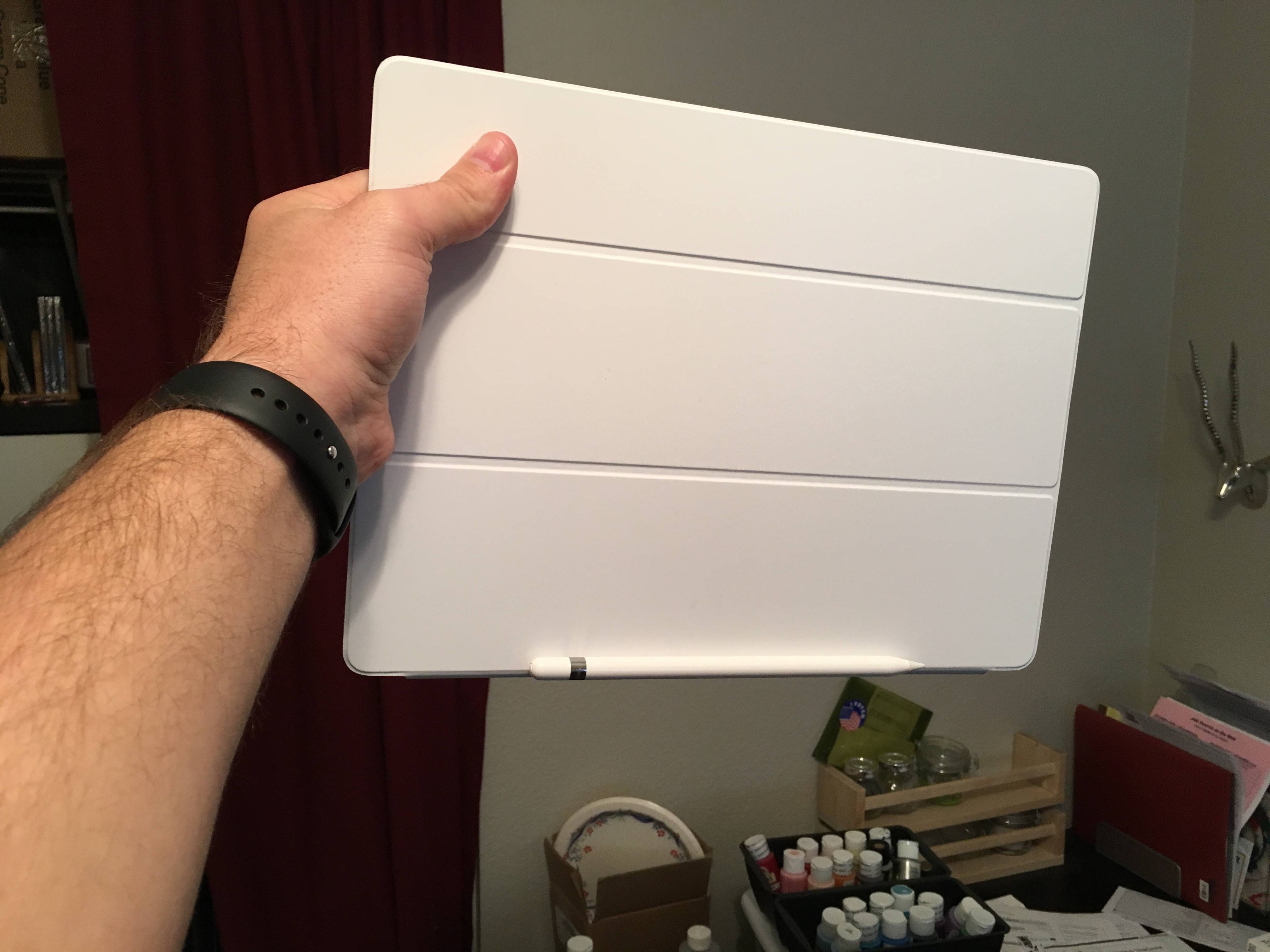 Apple Pencil attached to a Smart Cover