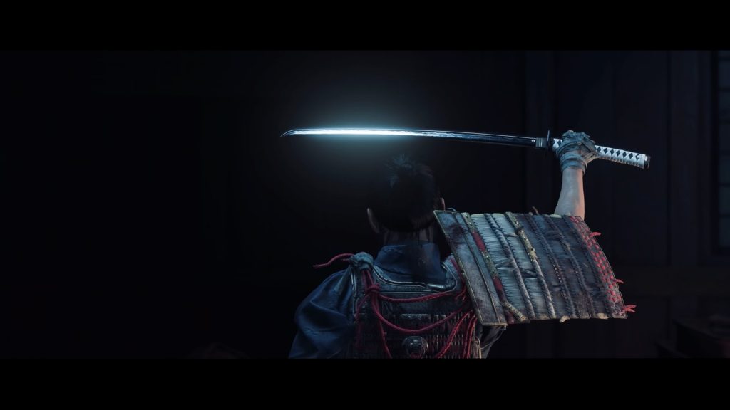 Close-up of Ghost of Tsushima's protagonist, Jin, holding his sword.