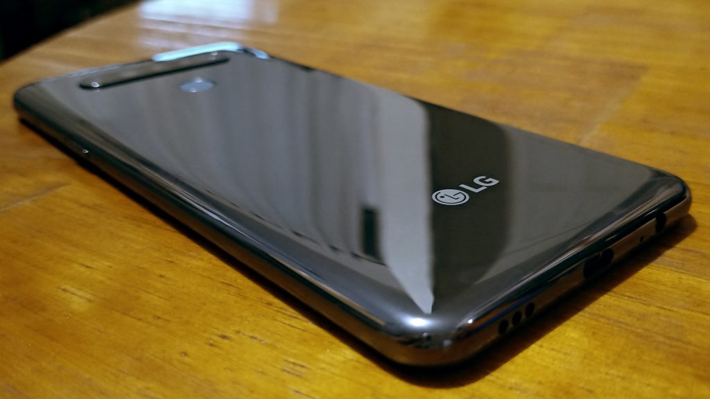 LG K51S silver on wooden table