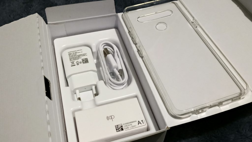 LG K61 kit with charger and headphones