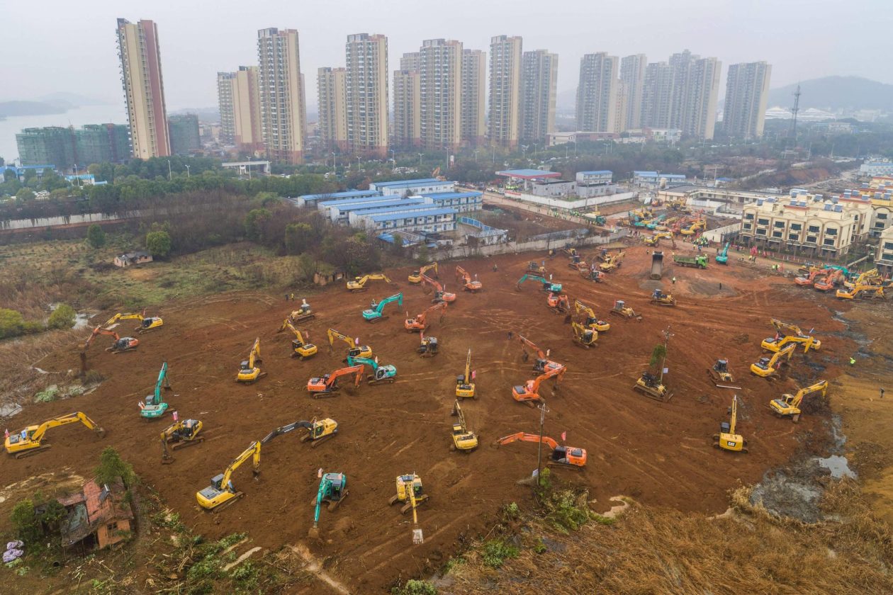 Tractors digging for hospital construction in Wuhan city